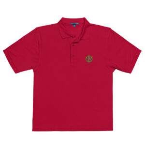 polo shirt featuring the Lions Den logo and ServPro sponsorship badge on the chest, representing the elite status in the firefighter challenge.