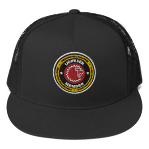 A black trucker hat featuring the Firefighter Challenge Lion’s Den Member logo embroidered on the front, representing membership in the elite Lion’s Den