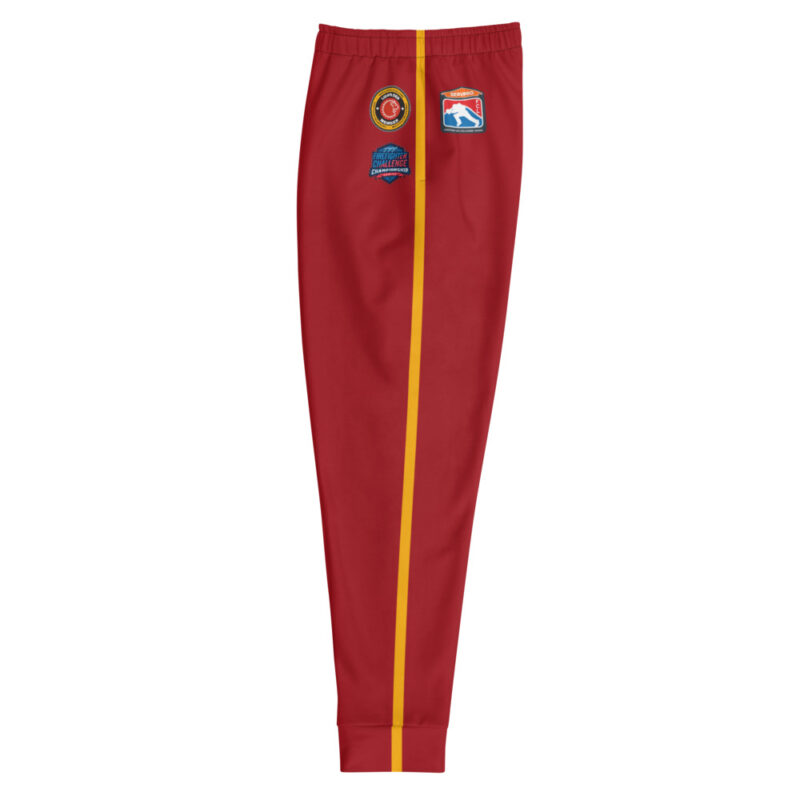 A pair of red joggers featuring the Firefighter Challenge Lion’s Den Member logo on the right leg, with black and yellow accents, representing elite status in the firefighting competition.