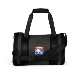 Black duffle bag with SERVPRO® Firefighter Challenge logo, featuring dual padded handles, adjustable shoulder strap, side pocket, and small inside pocket for valuables.