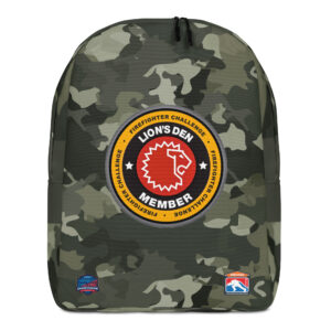 A camo-patterned backpack featuring the Lion’s Den Member emblem prominently in the center, with the Firefighter Challenge logos at the bottom.