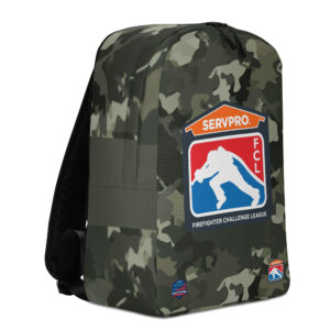 Camouflage-patterned backpack featuring the SERVPRO® Firefighter Challenge League logo in the center with a firefighter silhouette and additional FCL and Firefighter Challenge Championship logos at the bottom.