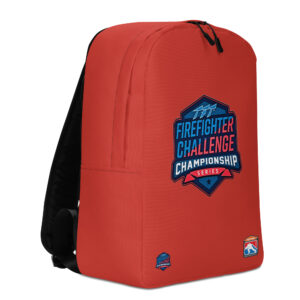 A bright red backpack featuring the Firefighter Challenge Championship logo in the center, with smaller SERVPRO and Championship logos near the bottom.