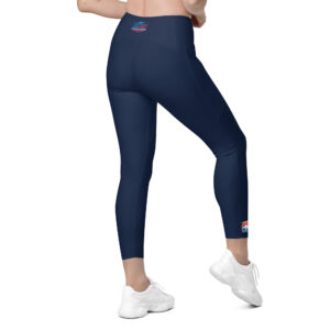 Woman wearing navy SERVPRO® Firefighter Challenge League leggings with the FCL logo on the ankle.