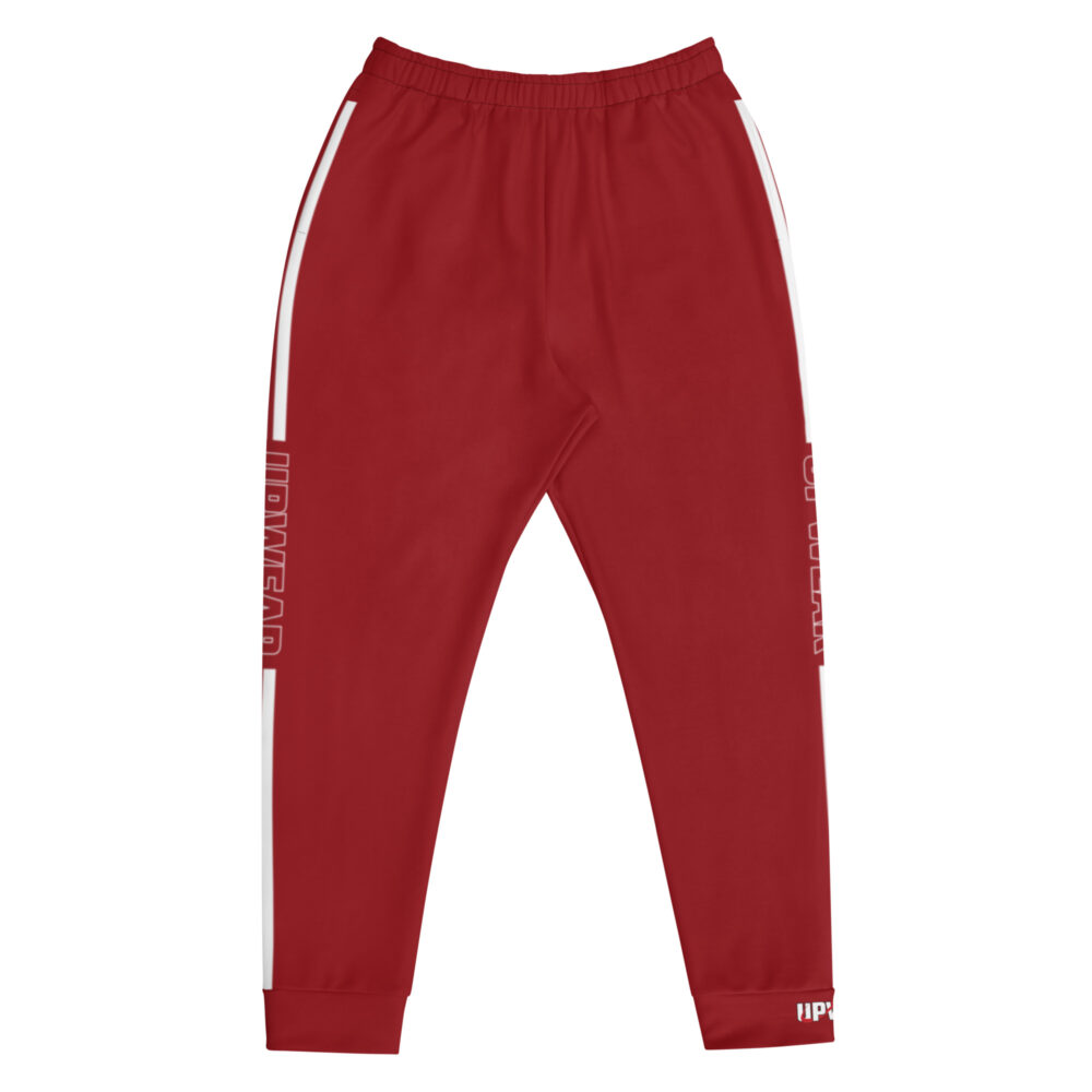 UPWEAR red precision fit joggers with breathable fabric, tapered fit, durable craftsmanship, and bold branding along the leg.