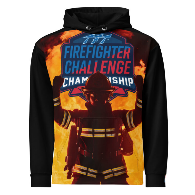 A bold hoodie featuring a firefighter standing in front of intense flames with the Firefighter Challenge Championship Series (FCCS) logo prominently displayed above. The dramatic design captures the spirit and resilience of the Firefighter Challenge.