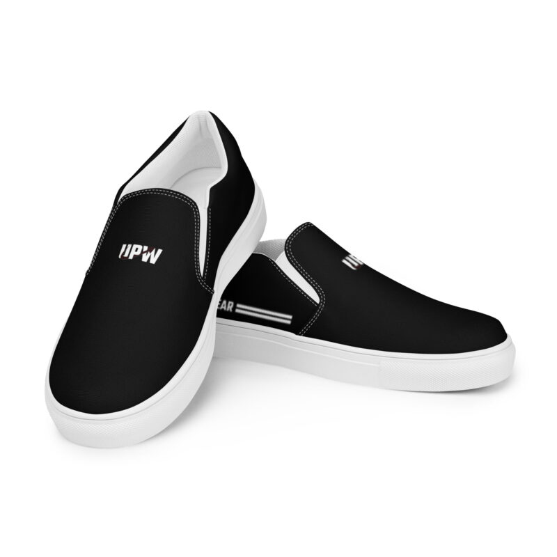 UPWEAR Men's black slip-on sneakers with cushioned insole and white sole, designed for comfort and casual style.