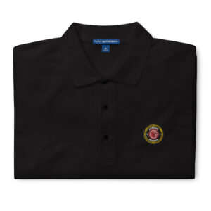 A premium embroidered polo featuring the Lion’s Den Member logo on the chest, available in six colors: Black, Red, Steel Grey, Cool Grey, Stone, and White. Classic design with soft cotton-poly fabric for ultimate comfort.