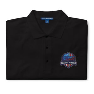 A premium polo featuring the US Record Holder Firefighter Challenge logo embroidered on the chest. Made from a soft cotton-poly blend, available in black, red, steel grey, cool grey, stone, and white.