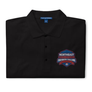 A premium polo shirt featuring the Northeast Regional Firefighter Challenge logo embroidered on the chest. Available in a soft cotton-poly blend in black, red, steel grey, cool grey, stone, and white.