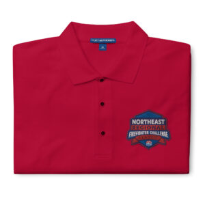 A premium polo shirt featuring the Northeast Regional Firefighter Challenge logo embroidered on the chest. Available in a soft cotton-poly blend in black, red, steel grey, cool grey, stone, and white.