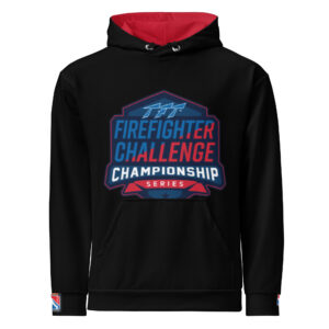 A black hoodie with a red-lined hood features the bold Firefighter Challenge Championship Series logo in blue, red, and white. The logo stands out on the chest, with the FCCS logo also on the wrist cuff, highlighting the competitive spirit of the event.